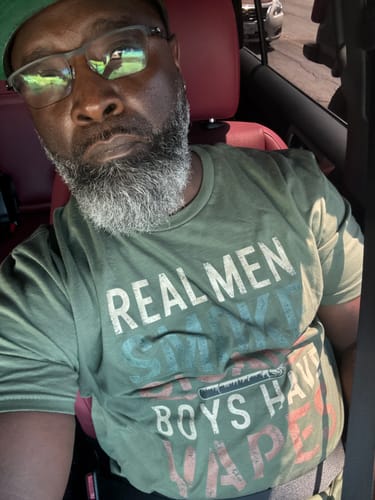 Legacy Layers Customer Wearing a Real Men Smoke Cigars T-Shirt. 5 Star Verified Loox Review