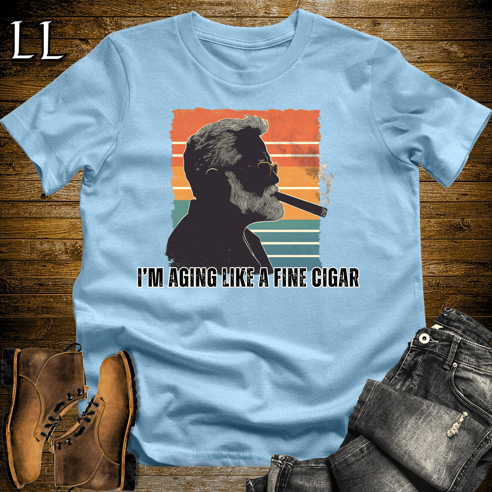 "Aging Like A Fine Cigar" cigar lifestyle graphic tee in Light Blue — by Legacy Layers