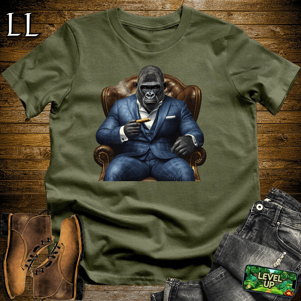 Gorilla in a blue checker suit smoking a cigar graphic tee in Military Green — by Legacy Layers