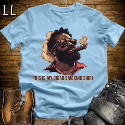 Black man in sunglasses smoking a cigar graphic tee in Light Blue — The Cigar Smoking Shirt by Legacy Layers